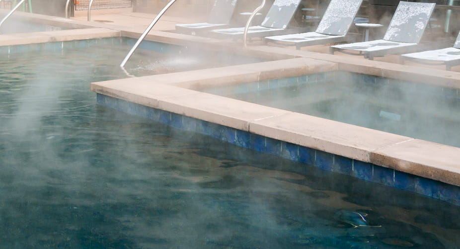 steaming outdoor hot tub pool