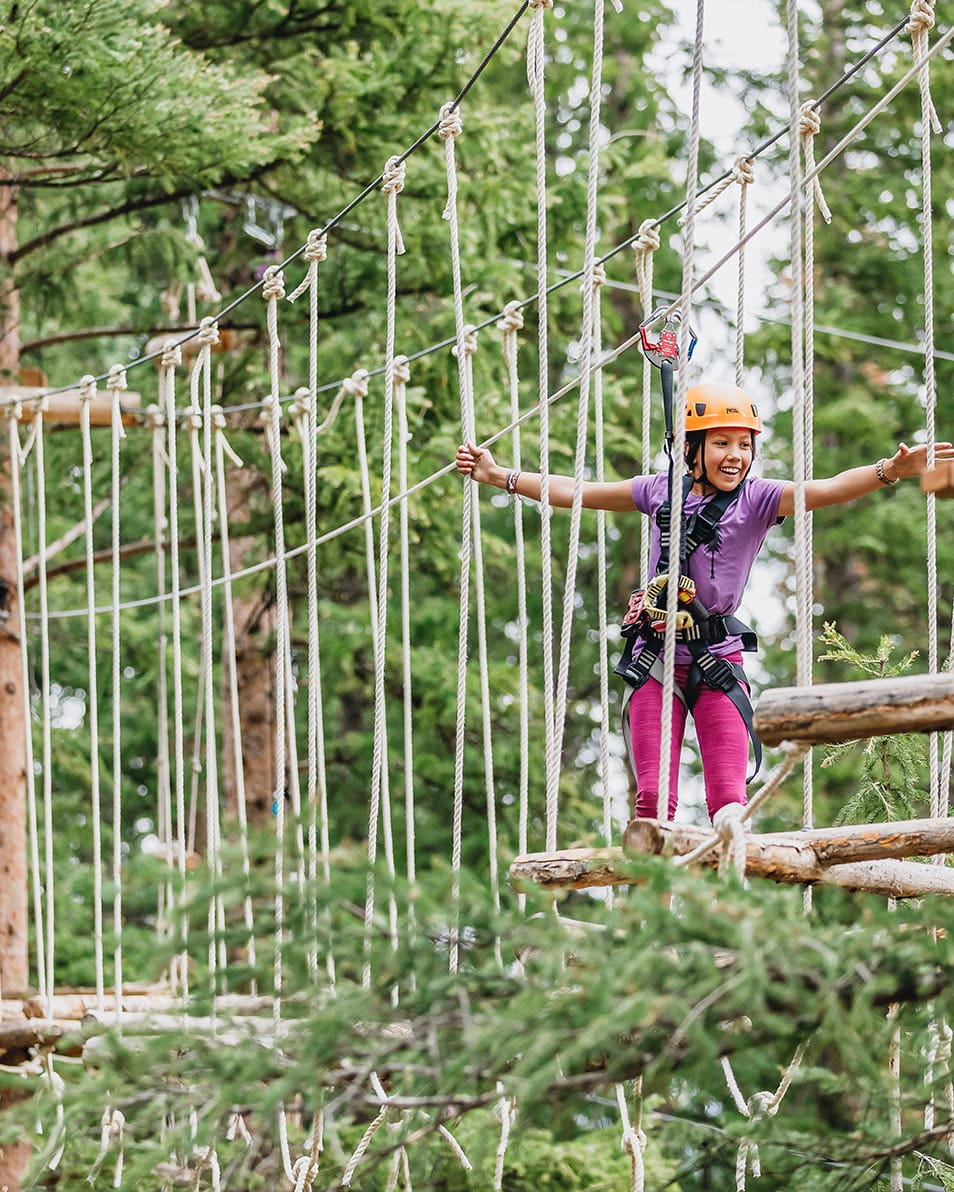 Girl on high ropes course
