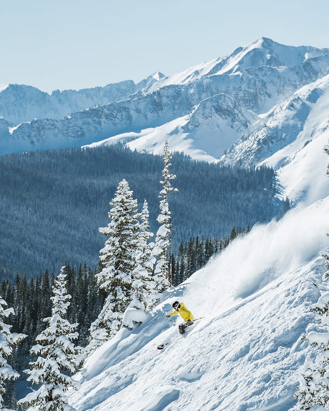 skier skiing down mountain