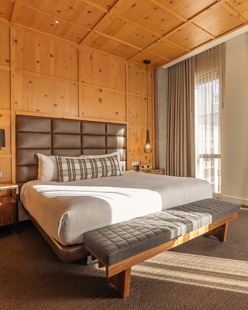 bed in guestroom at limelight denver