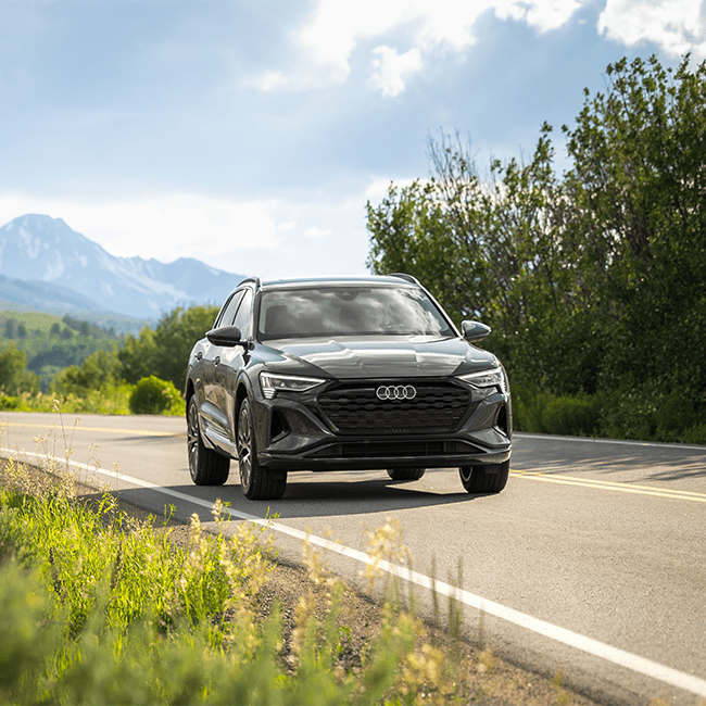 2024 Audi drives on a mellow mountain road in Ketchum, Idaho at Limelight Hotel