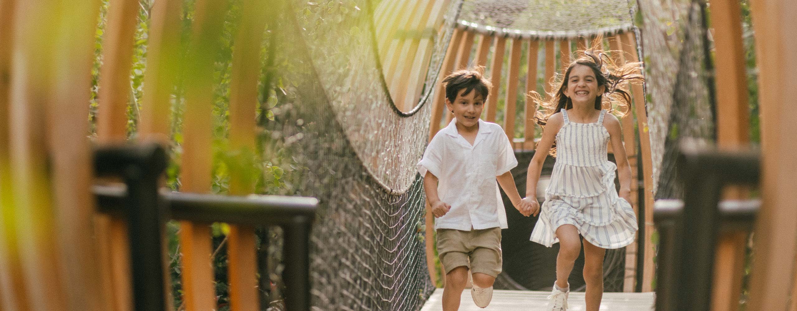 Kids running through playground