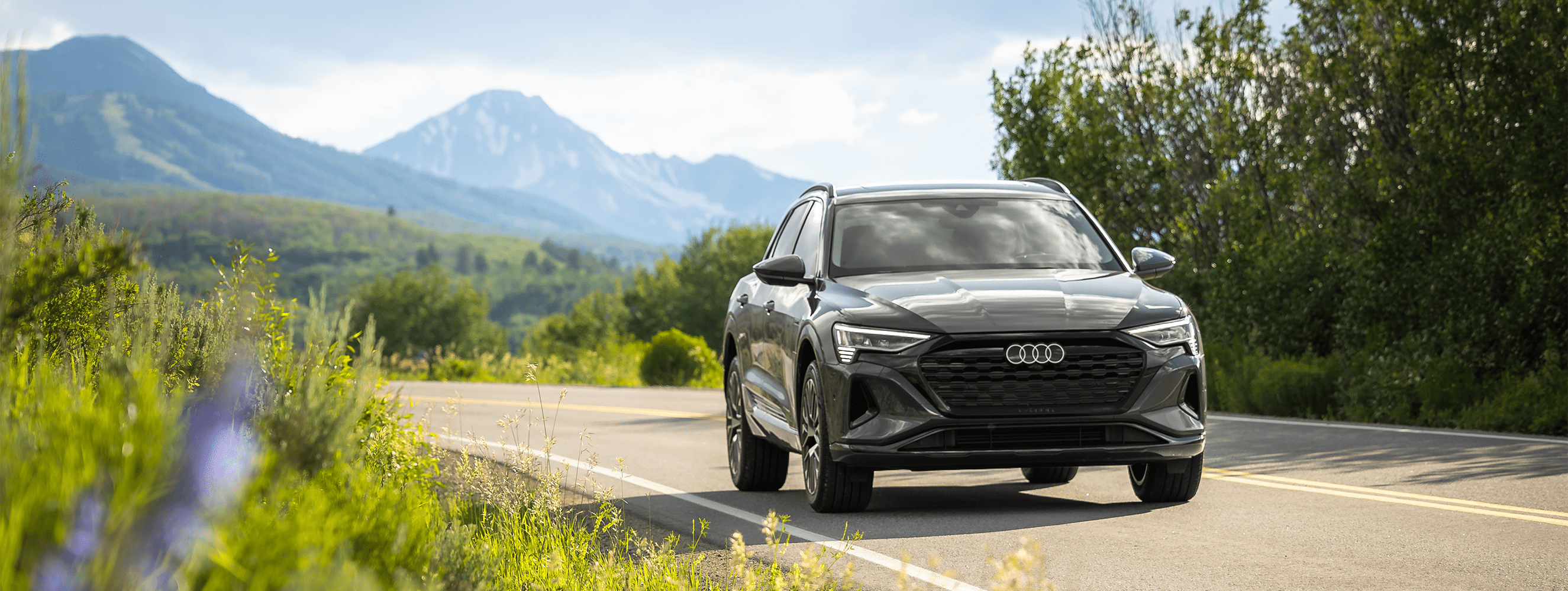 2024 Audi cruises the backroads of Aspen Colorado, on a sunny summer day